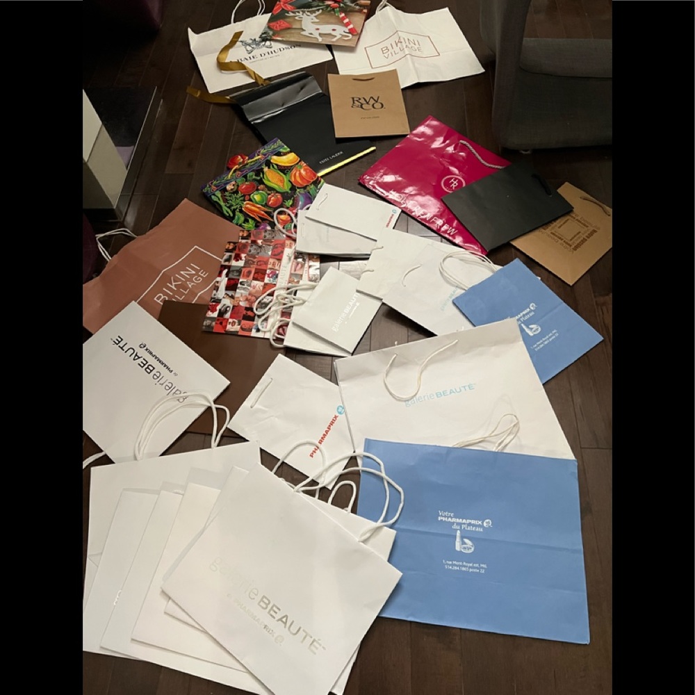 Paper bags from different stores and gift bags